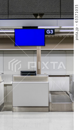 Check in counter at airport Check in counter at airport 63371035