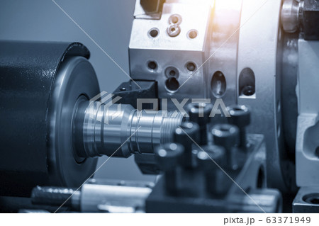 The operation of CNC lathe machine . The operation of CNC lathe machine . 63371949