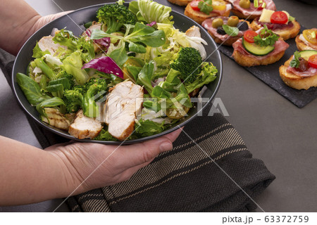 Grilled chicken, lettuce and broccoli salad Grilled chicken, lettuce and broccoli salad 63372759
