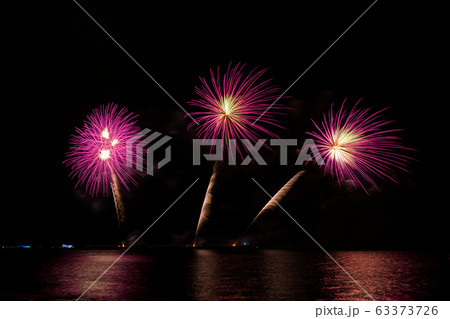 Colorful fireworks of various colors at night with celebration and anniversary concept. 63373726