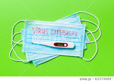 Top view of green background with virus outbreak 63374009
