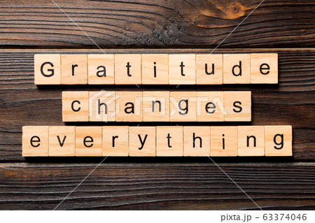 Gratitude changes everything word written on wood Gratitude changes everything word written on wood 63374046