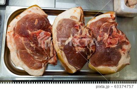 Raw pork in display of butcher market Raw pork in display of butcher market 63374757