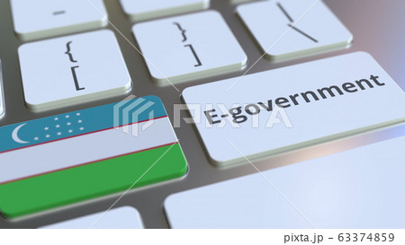 E-government or Electronic Government text and flag of Uzbekistan on the keyboard. Modern public services related conceptual 3D rendering E-government or Electronic Government text and flag of Uzbekistan on the keyboard. Modern public services related conceptual 3D rendering 63374859