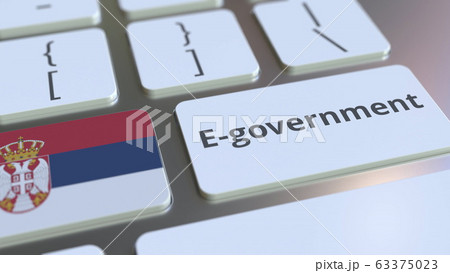 E-government or Electronic Government text and flag of Serbia on the keyboard. Modern public services related conceptual 3D rendering E-government or Electronic Government text and flag of Serbia on the keyboard. Modern public services related conceptual 3D rendering 63375023