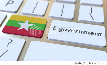 E-government or Electronic Government text and flag of Myanmar on the keyboard. Modern public services related conceptual 3D rendering 63375225
