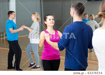 Young couple practicing active dance in pair 63376554
