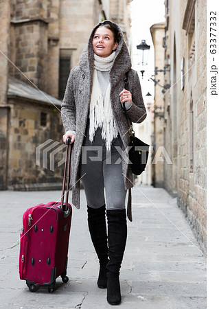 girl teenager with baggage outdoors girl teenager with baggage outdoors 63377332