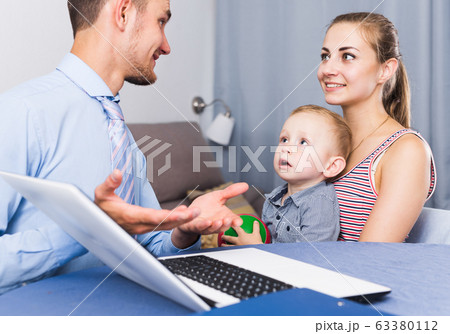 Worker of marketing company showing presentation 63380112