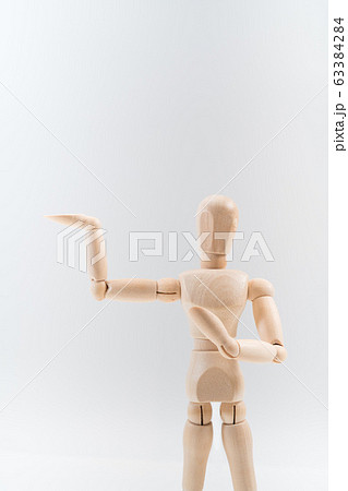 Wooden dummy proudly presents some invisible 63384284