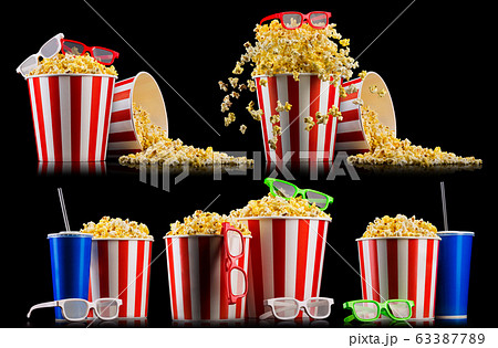 Set of striped buckets with popcorn, cups of drink and glasses isolated on black Set of striped buckets with popcorn, cups of drink and glasses isolated on black 63387789