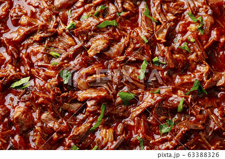 Beef shredded meat with sauce. Close up. Beef shredded meat with sauce. Close up. 63388326