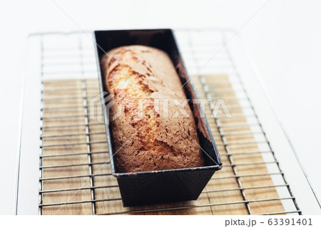 Organic bread in a baking pan. Selective focus shot Organic bread in a baking pan. Selective focus shot 63391401