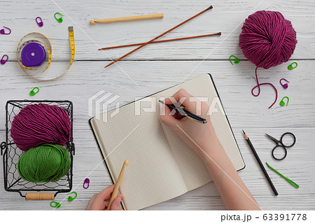 Background with knitting and crocheting tools and Background with knitting and crocheting tools and 63391778