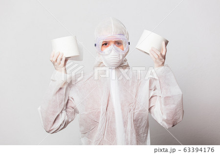 young doctor in protection suit and glasses with young doctor in protection suit and glasses with 63394176