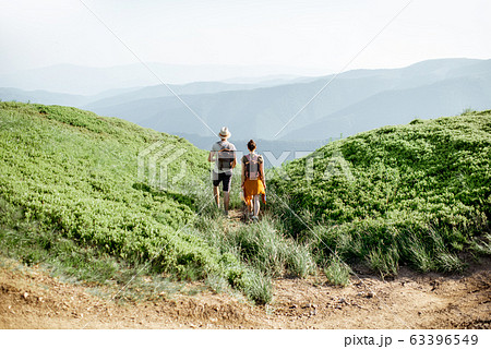 Couple traveling in the mountains Couple traveling in the mountains 63396549