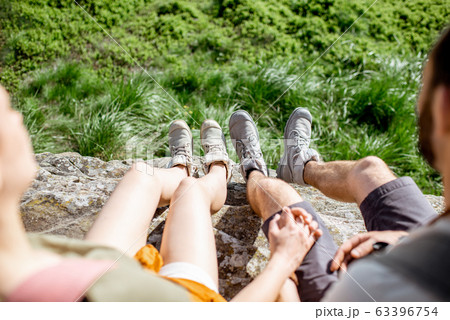 Couple traveling in the mountains Couple traveling in the mountains 63396754