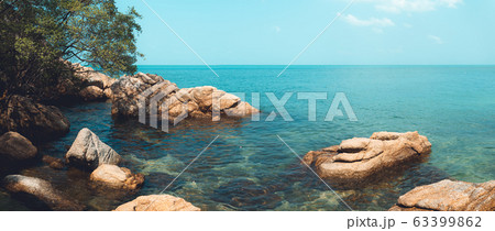 Blue sea and rocky mountains, evening bay in Krabi Blue sea and rocky mountains, evening bay in Krabi 63399862