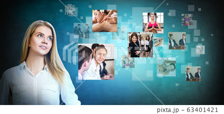 Business woman looks on images with her different hobbies. 63401421