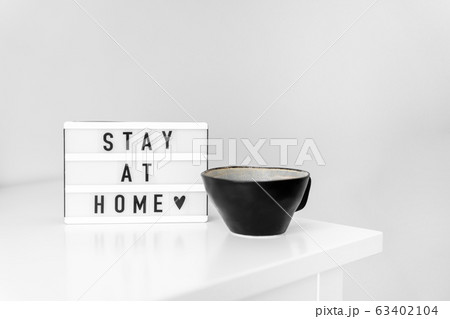 Stay at home sign. Covid-19 quarantine. Introvert concept.  63402104