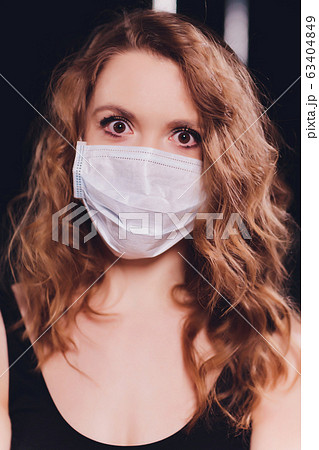 Woman suffer from cough with face mask protection. 63404849