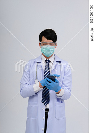 doctor physician practitioner wearing mask with doctor physician practitioner wearing mask with 63406456