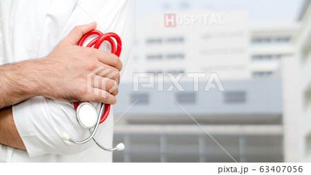 Young male doctor working at the hospital. Young male doctor working at the hospital. 63407056