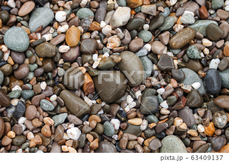 Sea pebble stones background beach rocks 63409137