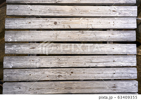 Close up wooden decking or flooring and tropical beach Close up wooden decking or flooring and tropical beach 63409355