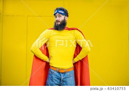Superman portrait on the yellow background Superman portrait on the yellow background 63410755