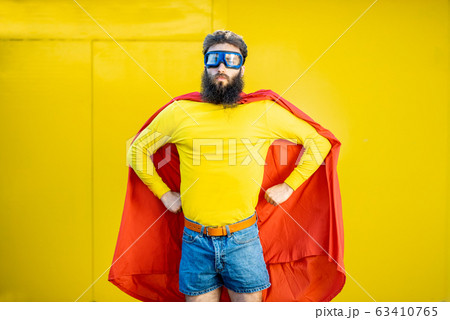 Superman portrait on the yellow background 63410765