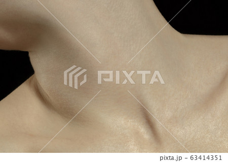 Texture of human skin. Close up of well-kept caucasian human body Texture of human skin. Close up of well-kept caucasian human body 63414351