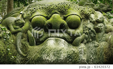 Stutue in Sacred Monkey Forest, Ubud, Bali, Indonesia 63420372