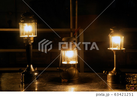 Ancient vintage hurricane lamp which is collectible, was included for the performance. Ancient vintage hurricane lamp which is collectible, was included for the performance. 63421251
