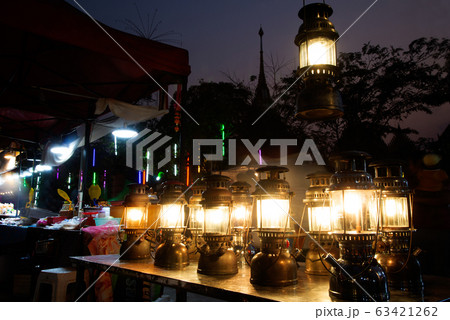 Ancient vintage hurricane lamp which is collectible, was included for the performance. Ancient vintage hurricane lamp which is collectible, was included for the performance. 63421262