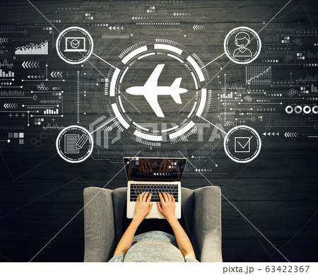 Flight ticket booking concept with person using a laptop Flight ticket booking concept with person using a laptop 63422367