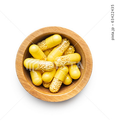 Vitamin capsules. Vitamin C pills. Vitamin capsules. Vitamin C pills. 63422435