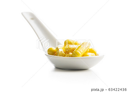 Vitamin capsules. Vitamin C pills. Vitamin capsules. Vitamin C pills. 63422436