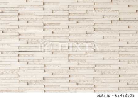 Granite tiled wall detailed pattern texture background in natural light creme beige color. 63433908