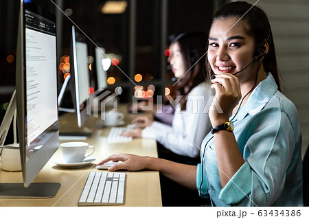 Call Center working at night. Call Center working at night. 63434386