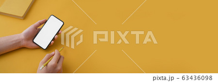 Cropped shot of a man using blank screen 63436098