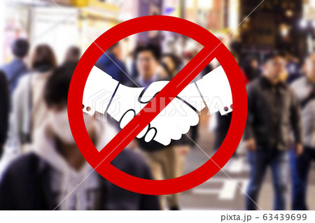 No handshake sign on abstract crowd background. Hygiene and Quarantine Concept. No handshake sign on abstract crowd background. Hygiene and Quarantine Concept. 63439699