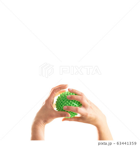 Hands messing around with coronavirus over white 63441359