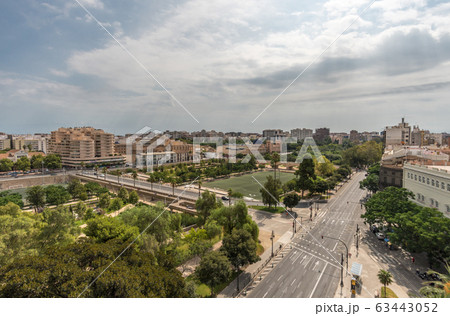 Valencia Turia river park gardens and skyline in Spain Valencia Turia river park gardens and skyline in Spain 63443052