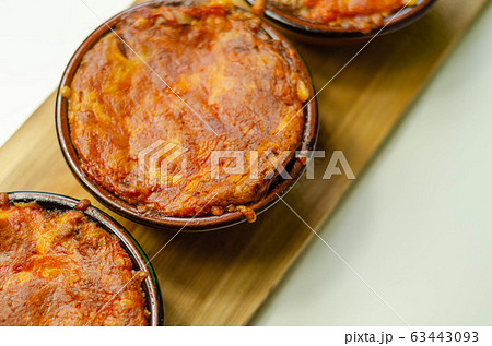 Traditional french onion gratin soup served in a 63443093