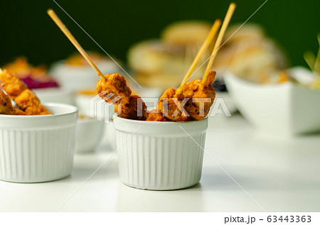 Satay chicken breast marinated in Indonesian style 63443363