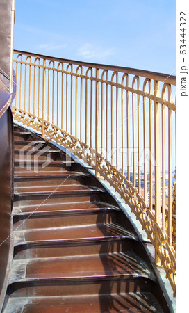 COPENHAGEN, DENMARK - JUL 06th, 2015: External winding staircase to the top of Church of Our Saviour Vor Frelsers Kirke offering extensive views over central Copenhagen COPENHAGEN, DENMARK - JUL 06th, 2015: External winding staircase to the top of Church of Our Saviour Vor Frelsers Kirke offering extensive views over central Copenhagen 63444322