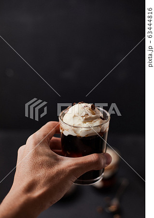 Iced coffee with vanilla ice cream. 63444816