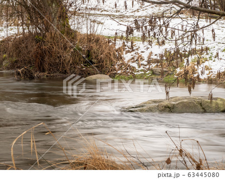 Long exposure of flowing water in nature 63445080