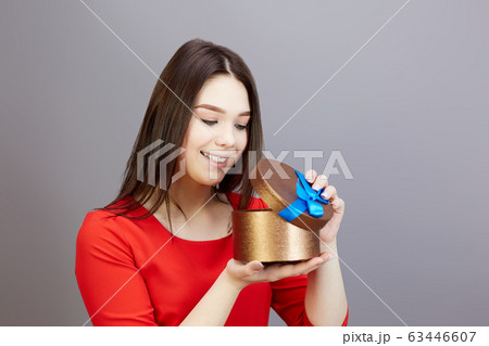Lovely girl 15-20 years old in a red dress with a Lovely girl 15-20 years old in a red dress with a 63446607